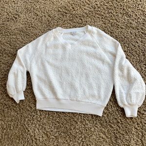 white fuzzy sweater